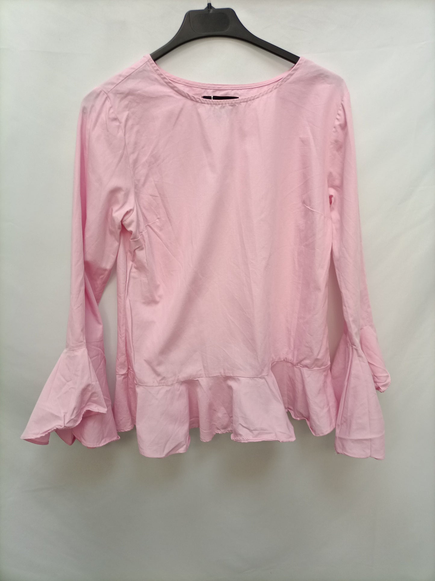 PRIMARK. Blusa rosa volantes T.36