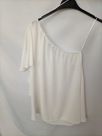 BLANCO.Blusa blanca asimétrica T.m