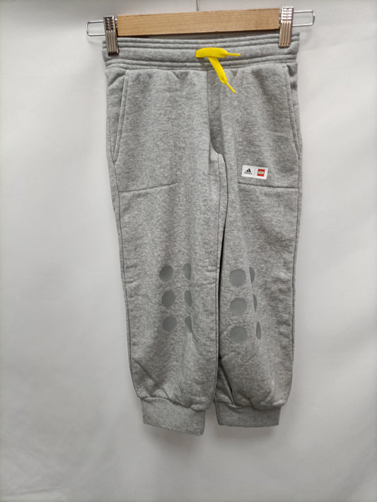 ADIDAS. Pantalones chandal gris T.6 años