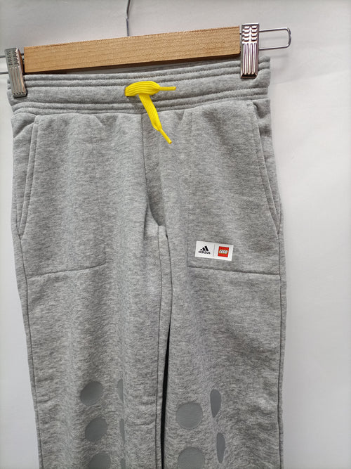 ADIDAS. Pantalones chandal gris T.6 años