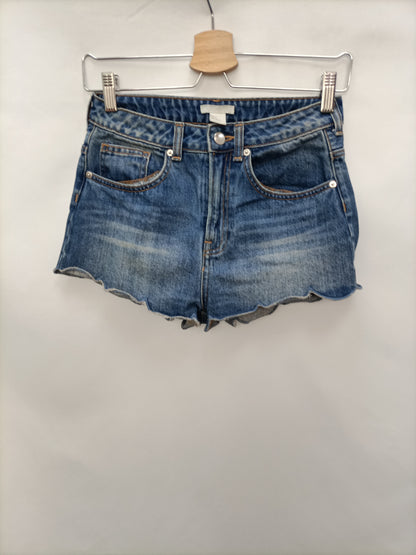 H&M. Shorts vaqueros oscuro T.34