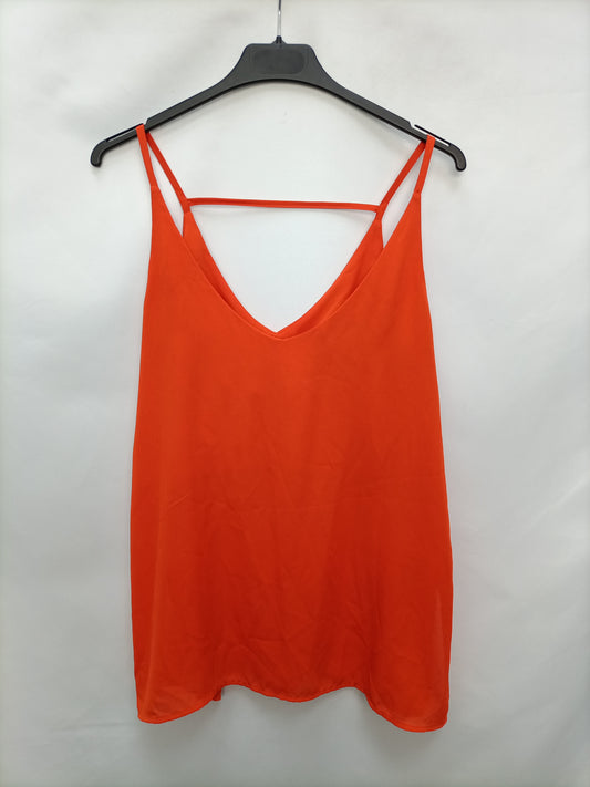 H&M. Top fluido naranja T.44