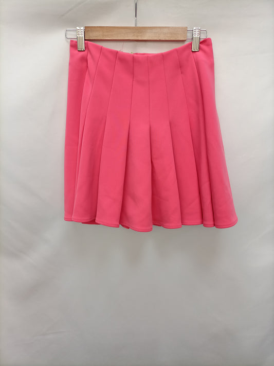 H&M. Falda tablas rosa T.36