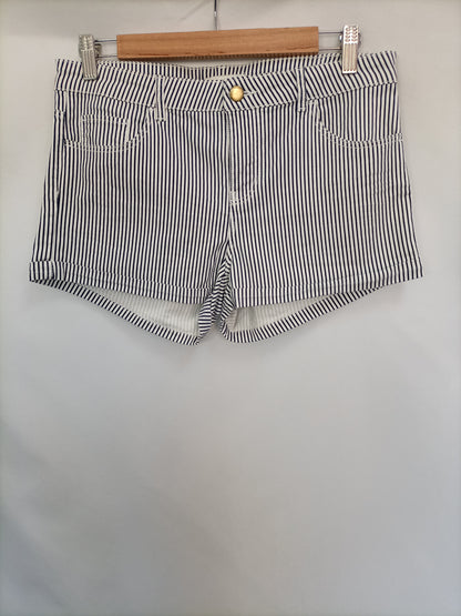 H&M. Shorts denim rayas T.38