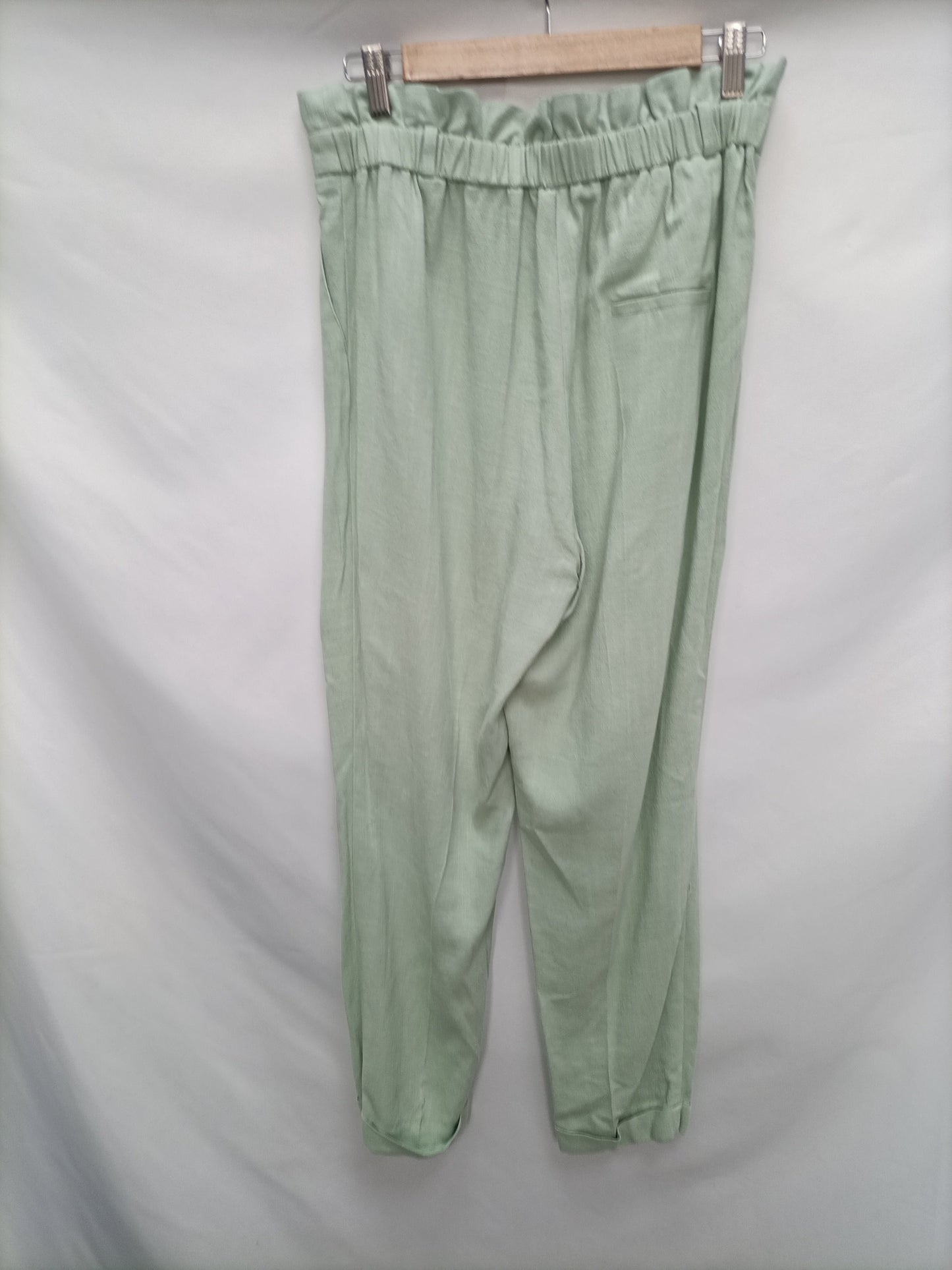 PRIMARK. Pantalón fluido verde T.38