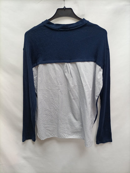 BERSHKA. Jersey azul con blusa  T.s