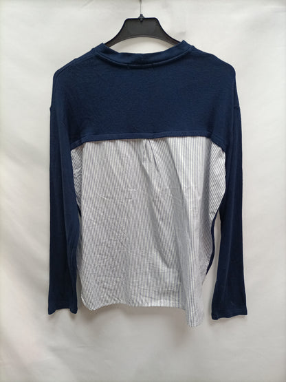 BERSHKA. Jersey azul con blusa  T.s