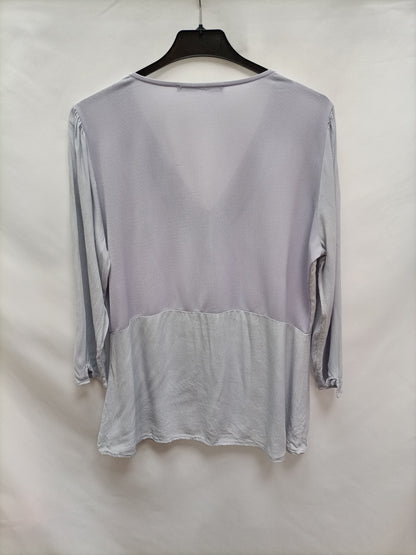 SFERA. Blusa fluida azules  T.l