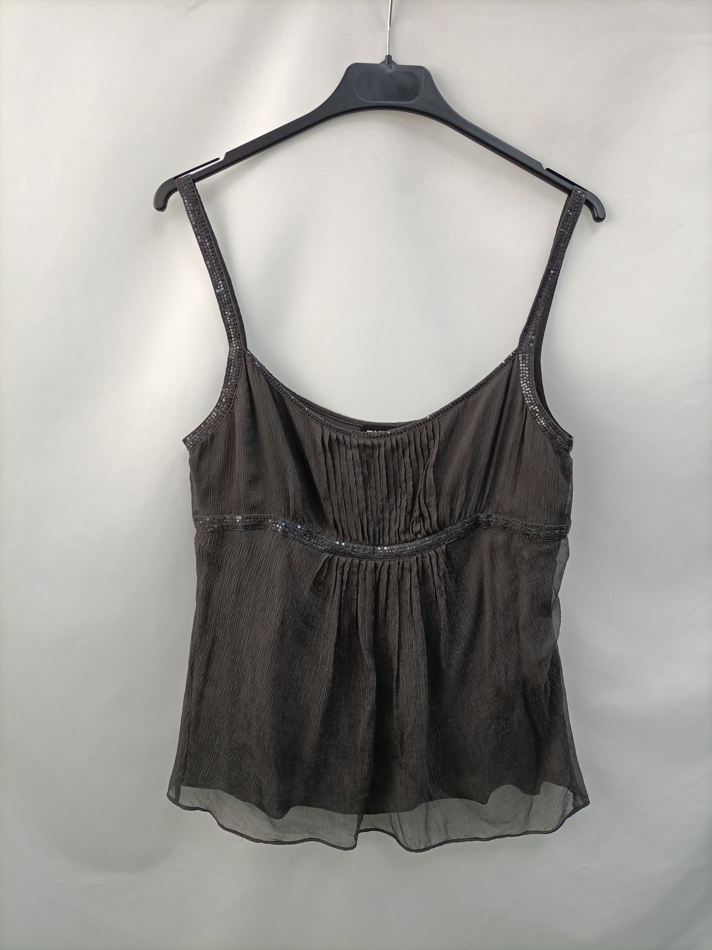 DKNY. Blusa seda gris T.6(m)