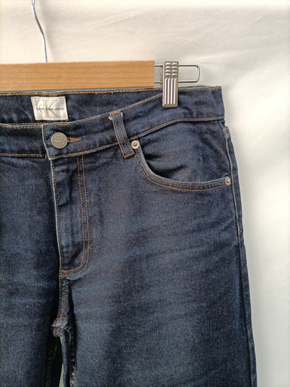 CALVIN KLEIN. Pantalón pirata oscuro T.7(40)