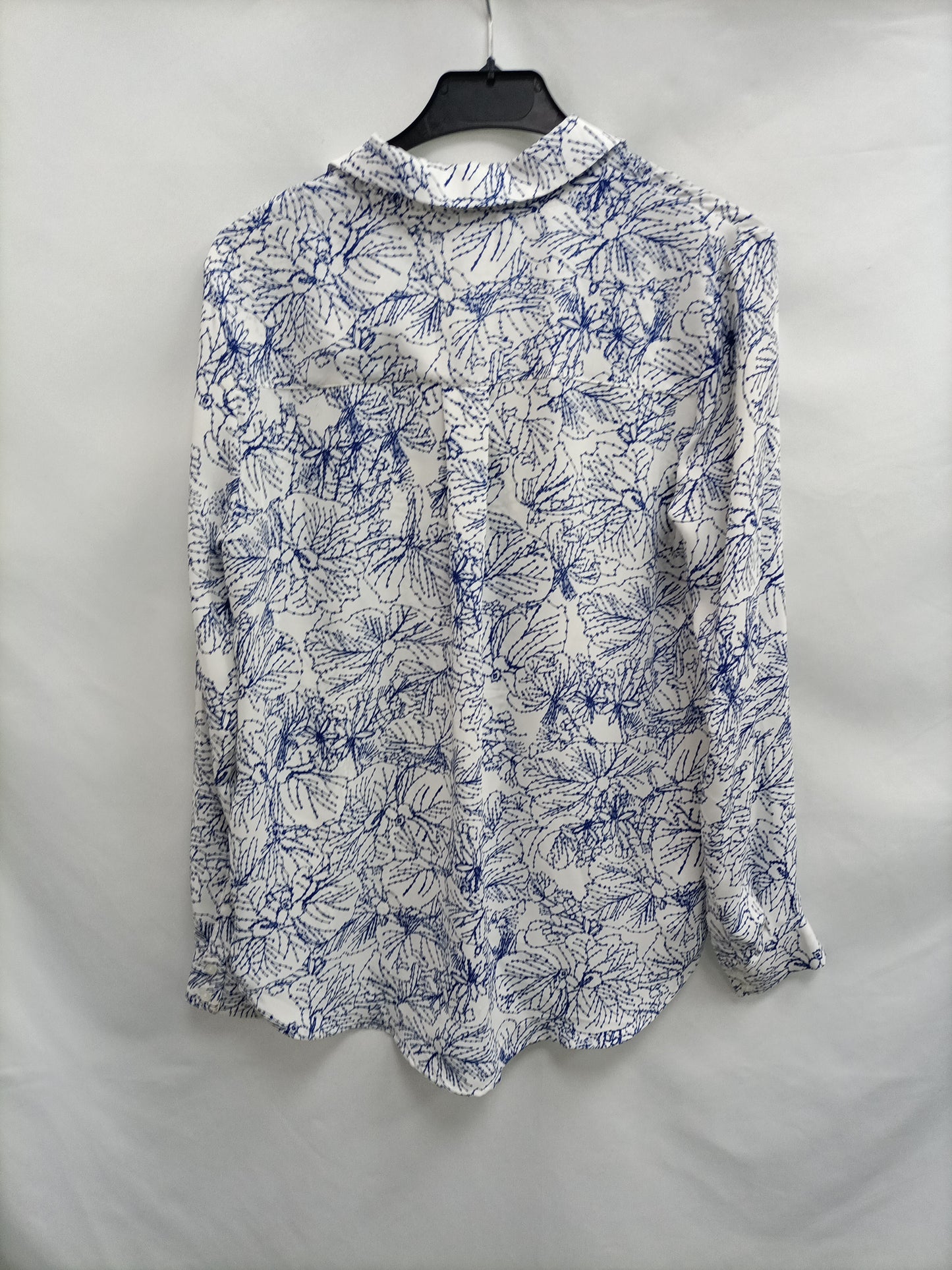 H&M. Blusa estampado azul  T.34