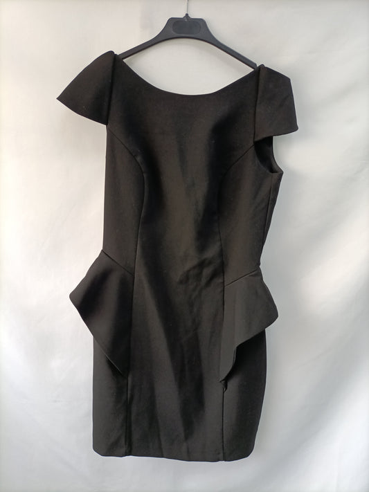 BLANCO. Vestido negro volante T.m