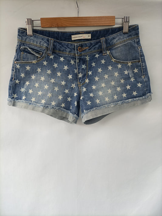 GREEN COAST. Shorts estrellas T.s