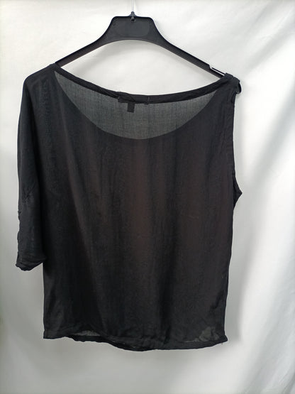 BERSHKA. Blusa asimétrica T.L