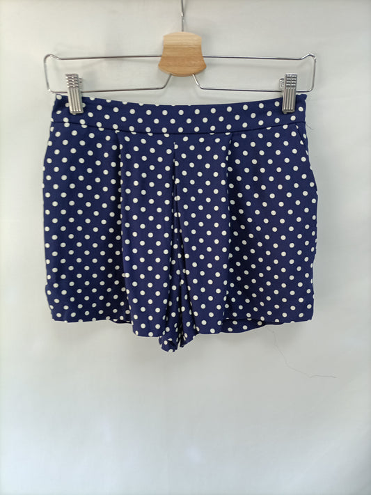 ZARA. Short azul lunares blancos T.xs