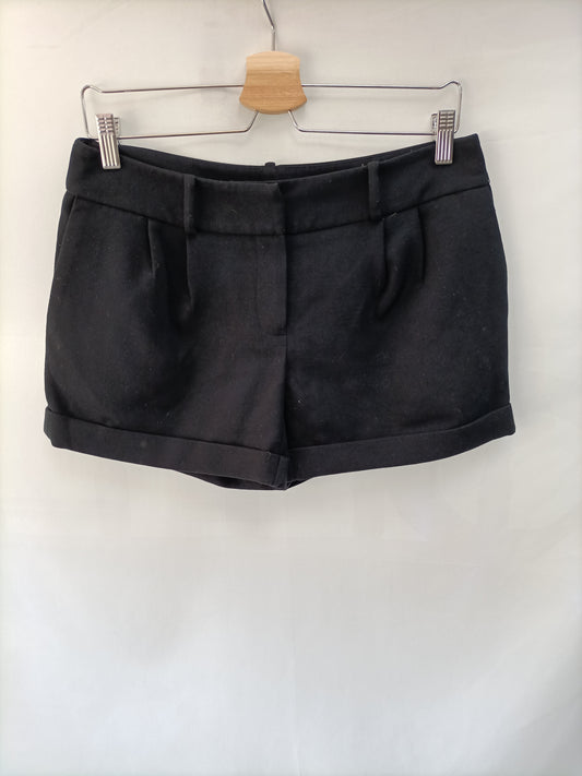 SFERA.Shorts negros vestir T.36