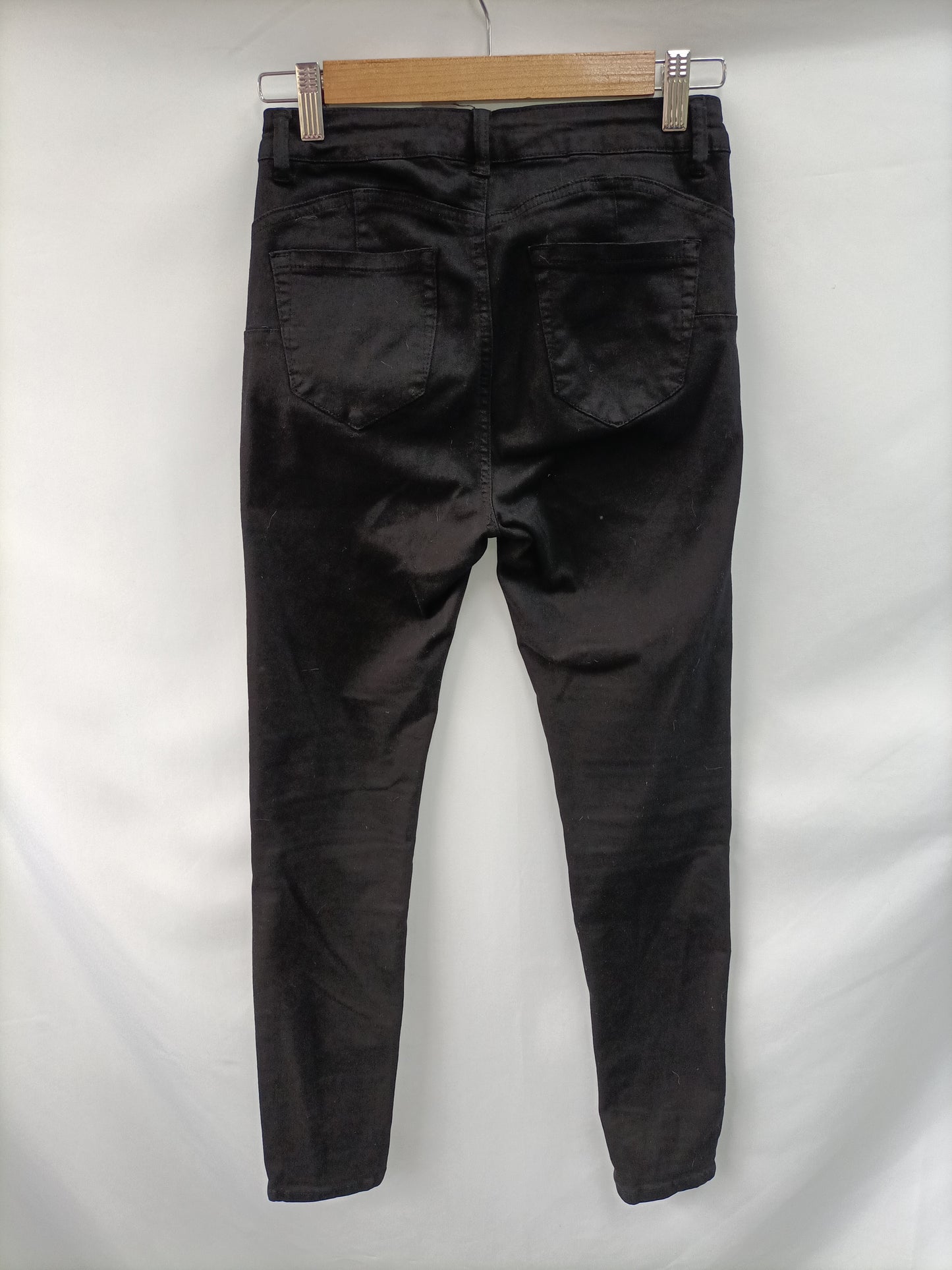 OTRAS. pantalon vaquero negro pitillo T.s