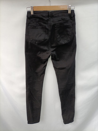 OTRAS. pantalon vaquero negro pitillo T.s