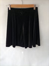 BRANDY MELVILLE. falda negra terciopleo T.s