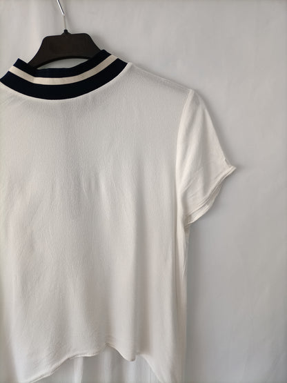 OTRAS. Top blanco asimetrico T.u(s)