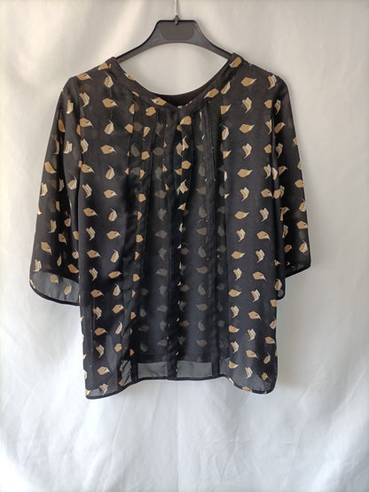 ZARA. Blusa negra estampada  T.s