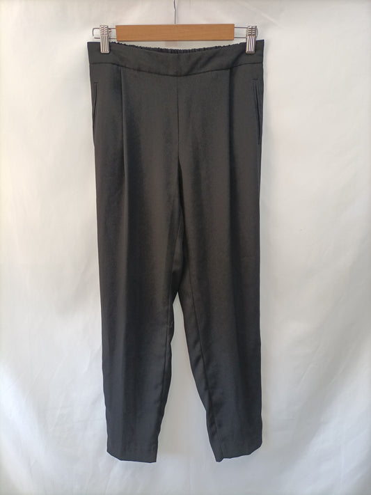 ZARA. Pantalón negro fluido con raya lateral dorada T.s