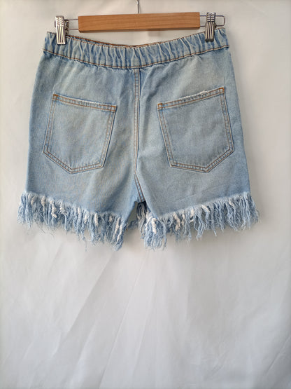 ZARA.Shorts denim deshilachados T.32