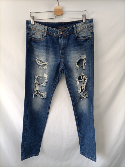 OTRAS. Pantalón denim rotos T.xl