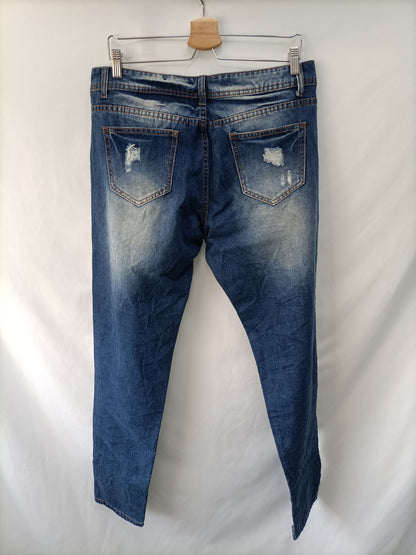 OTRAS. Pantalón denim rotos T.xl