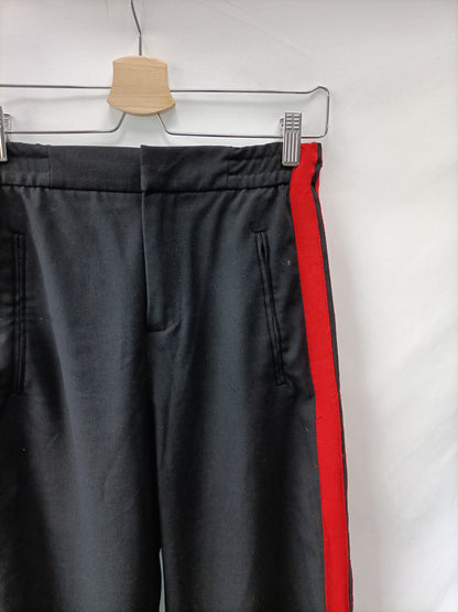 ZARA. Pantalón raya roja T.xs