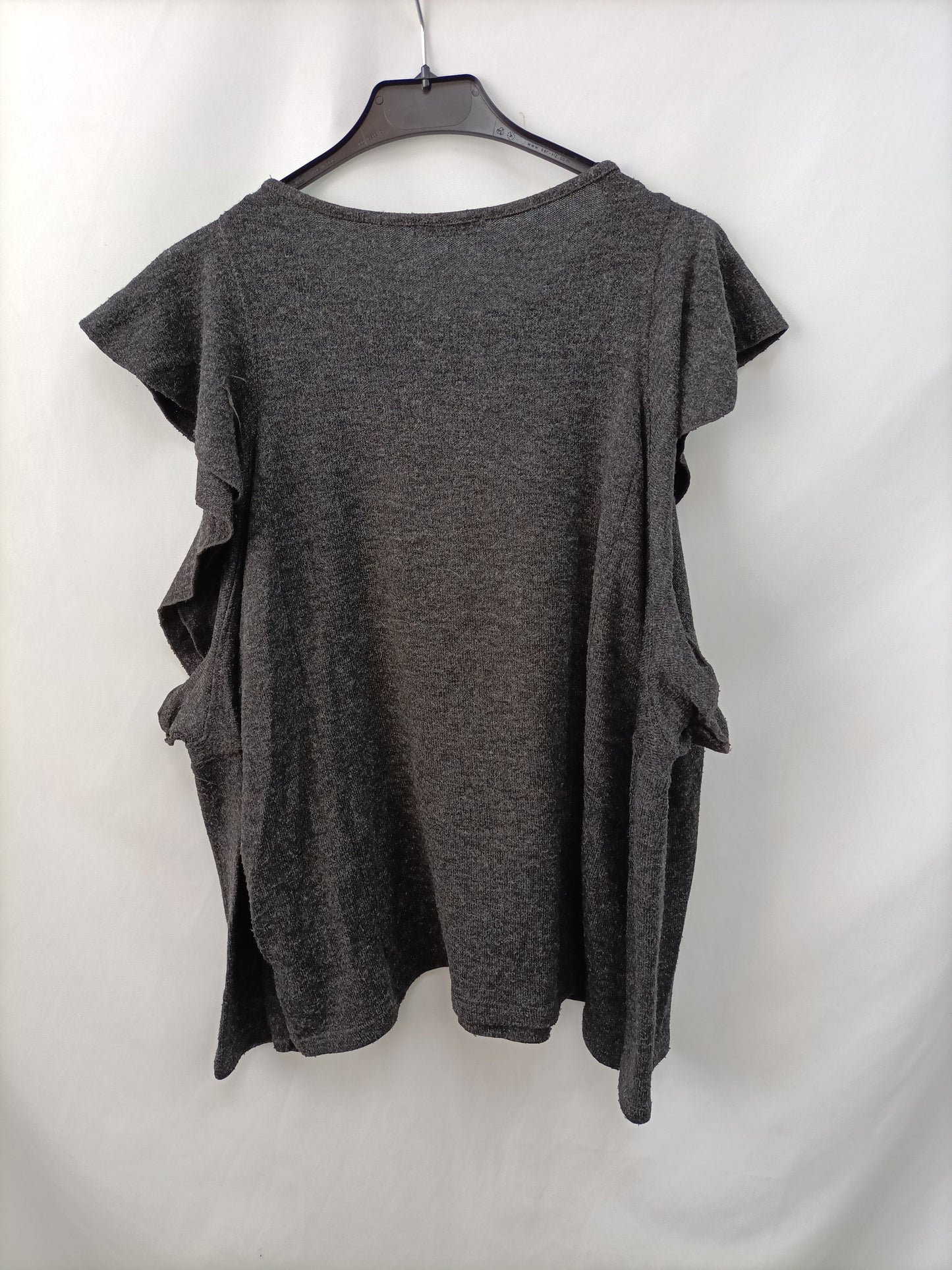 ZARA. Jersey volantes gris T.l