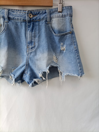 OTRAS. Shorts denim deshilachados T.m