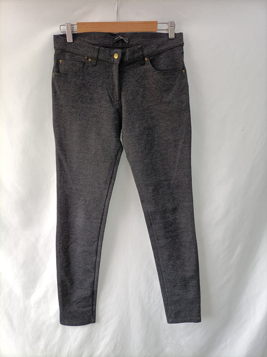 ZARA. Pantalón gris elástico T.l