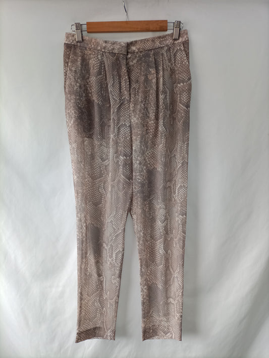 ACNE. Pantalón animal print T.34