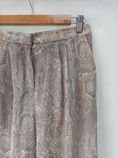 ACNE. Pantalón animal print T.34