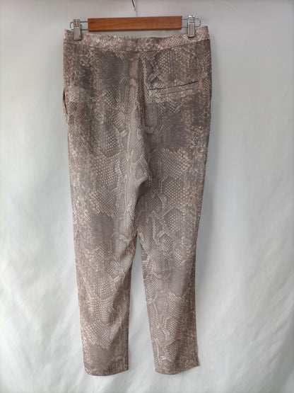 ACNE. Pantalón animal print T.34