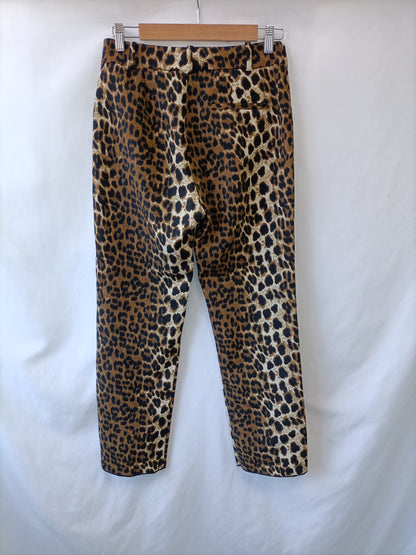 SFERA. Pantalón animal print T.40