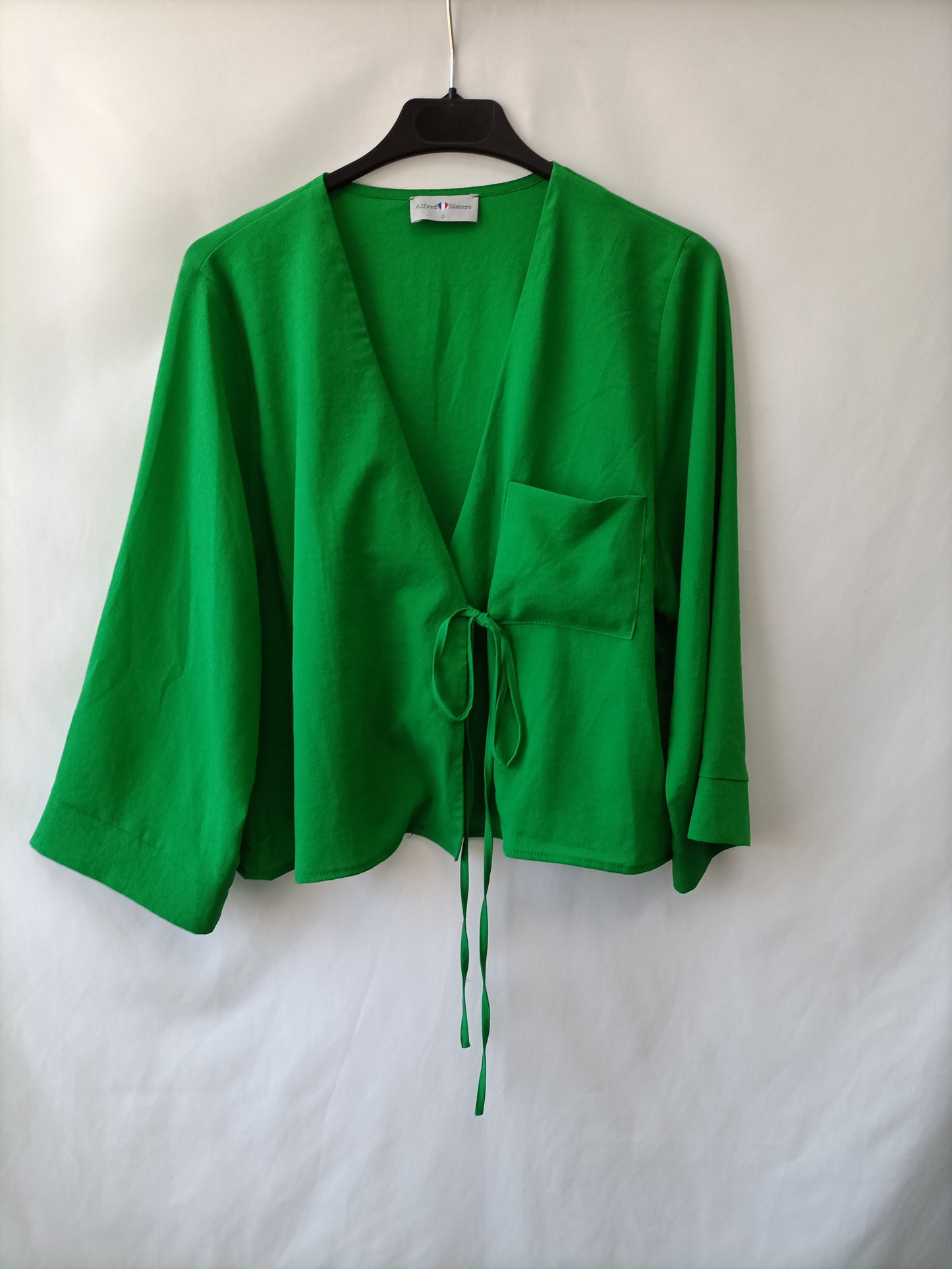 ALFRED SISTER. blusa verde cruzads T.m