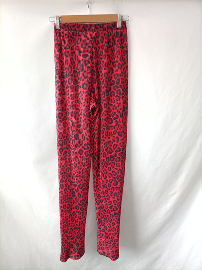 PULL&BEAR. Pantalón plisado animal print T.s