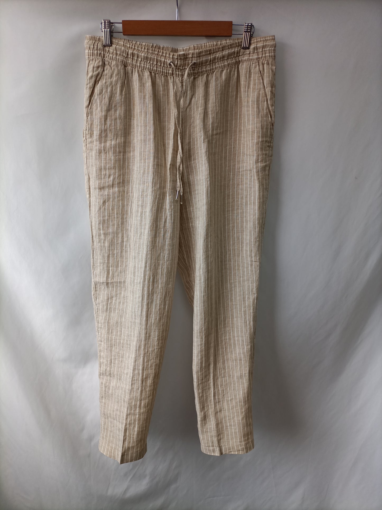 H&M. Pantalón beige rayas T.38