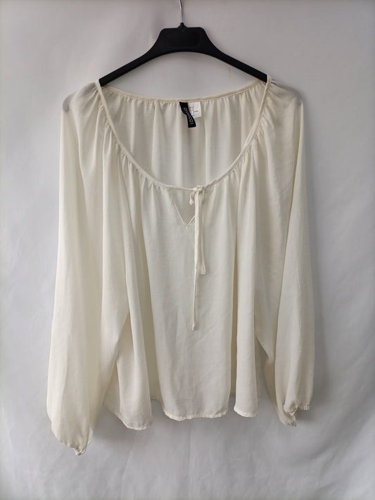 H&M. blusa blanca lazo T.38