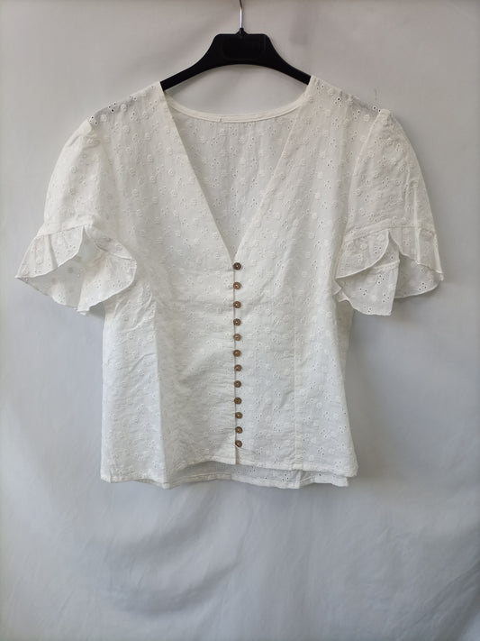 OTRAS. Blusa blanca troquelado T.s