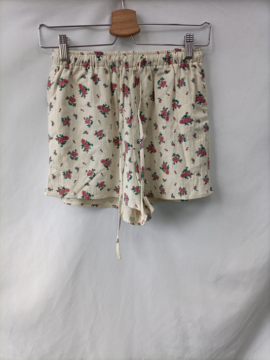 OTRAS. Pantalón beige flores T.u(s)