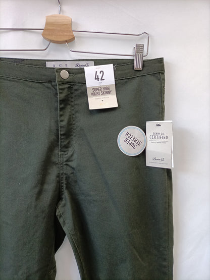 PRIMARK. Pantalón verde pitillo T.42