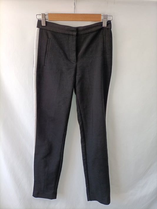 ZARA. Pantalón negro raya T.xs