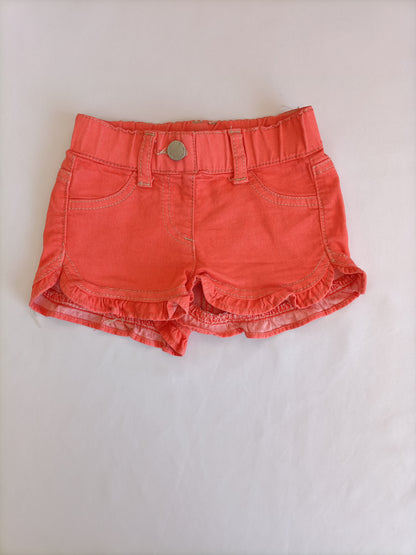 BENETTON. Shorts naranja T.1 año