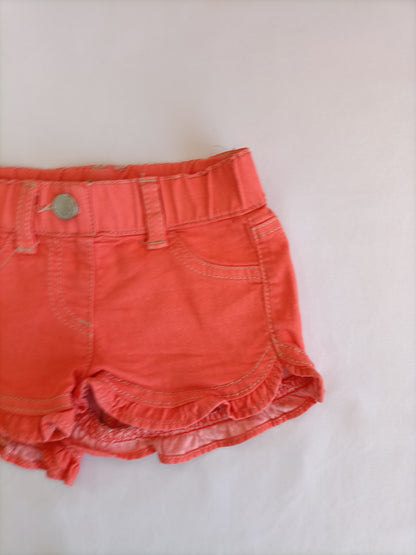 BENETTON. Shorts naranja T.1 año