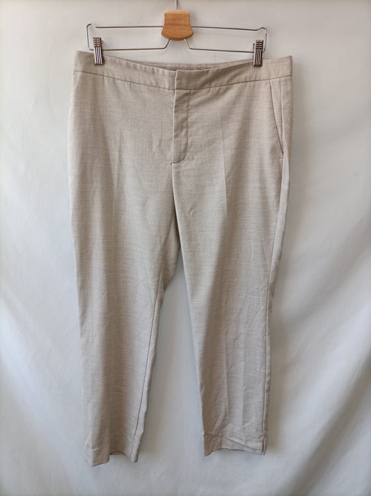 ZARA. Pantalones de vestir beige T.42