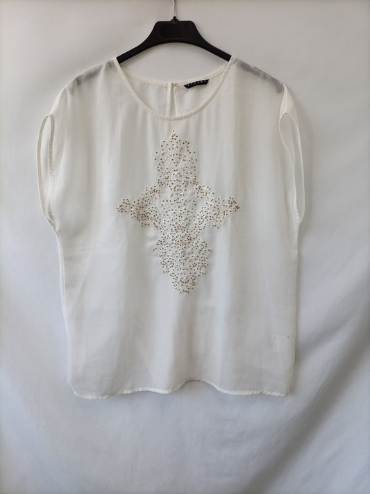 SISLEY. Blusa blanca sin mangas pelotas doradas T.l