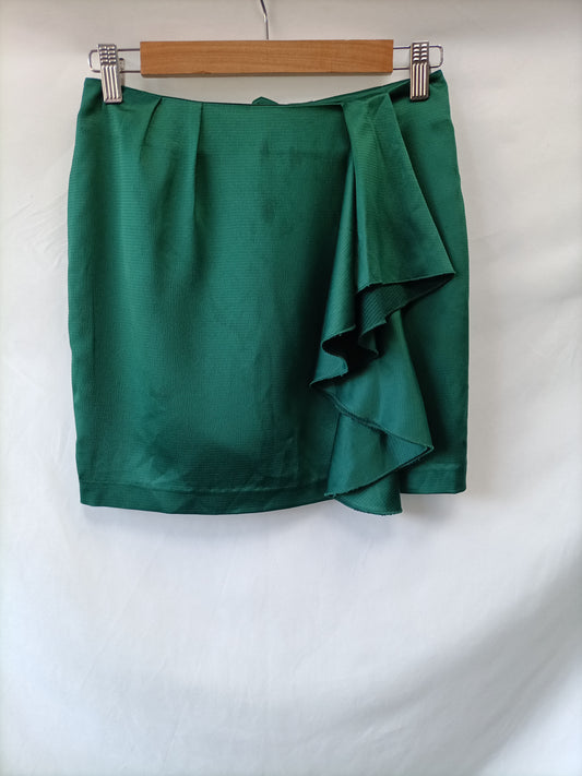 H&M. Falda verde lazada T. 34